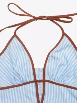 Robe longue rayée dos nu à décolleté plongeant style bohème chic idéale pour la plage ou la ville.