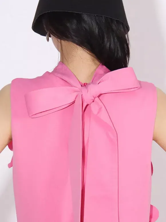 Robe longue rose sans manches ornée de fleurs en 3D