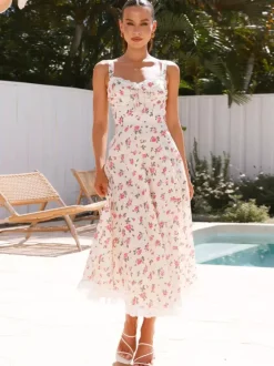 Robe longue sans manches à imprimé floral et bordure en dentelle pour l'été 2026