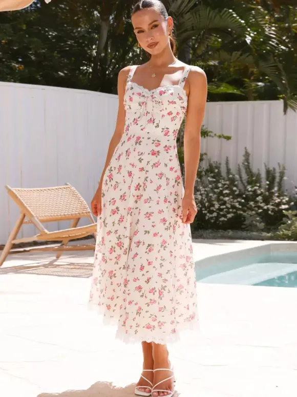 Robe longue sans manches à imprimé floral et bordure en dentelle pour l'été 2026