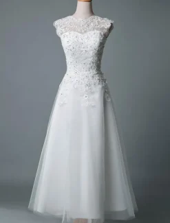 Robe mariée courte col rond en dentelle pailletes jupe en tulle zip sur dos Robe de mariage