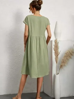 Robe midi à manches courtes pour femme - Robe t-shirt ample minimaliste unie avec poches - Idéale pour un look décontracté d'été 2026