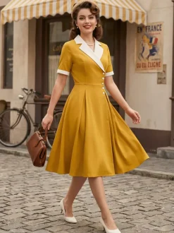Robe midi élégante à revers rétro et boutons latéraux coupe ajustée et évasée pour femme (collection 2026)