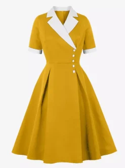 Robe midi élégante à revers rétro et boutons latéraux coupe ajustée et évasée pour femme (collection 2026)