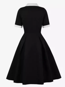 Robe midi élégante à revers rétro et boutons latéraux coupe ajustée et évasée pour femme (collection 2026)