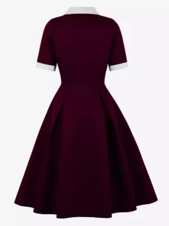 Robe midi élégante à revers rétro et boutons latéraux coupe ajustée et évasée pour femme (collection 2026)