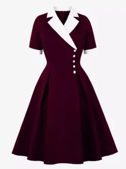 Robe midi élégante à revers rétro et boutons latéraux coupe ajustée et évasée pour femme (collection 2026)