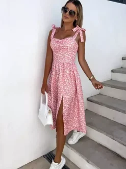 Robe midi rose en lycra spandex pour femme dos nu sans manches à fleurs et taille naturelle ornée de fleurs.
