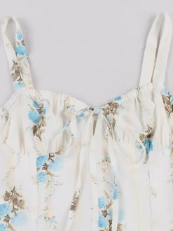 Robe midi trapèze sans manches à imprimé floral et buste froncé pour femme 2026