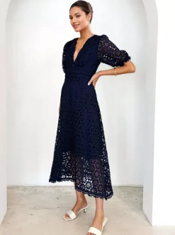 Robe mi-longue en dentelle à col en V et manches bouffantes pour femme (2026)