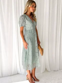Robe mi-longue fleurie à col en V et manches bouffantes pour femme (2026)