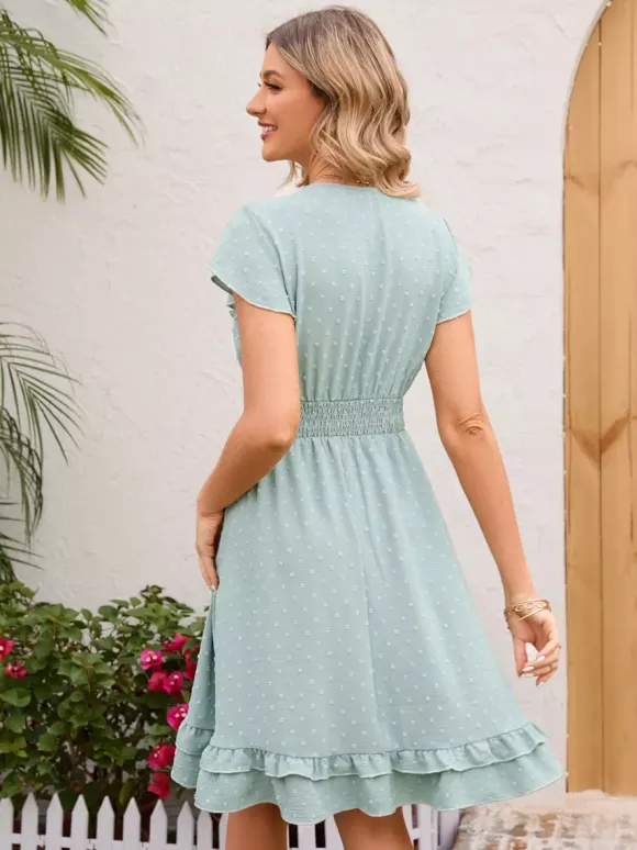 Robe mi-longue rose pâle à col en V et ourlet à volants avec taille froncée 2026