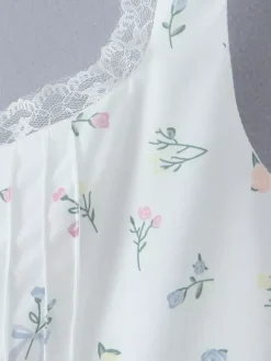 Robe mi-longue trapèze à imprimé floral et décolleté en c艙ur pour l'été 2026