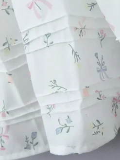 Robe mi-longue trapèze à imprimé floral et décolleté en c艙ur pour l'été 2026
