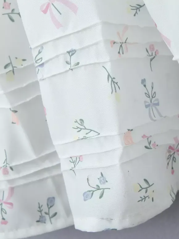 Robe mi-longue trapèze à imprimé floral et décolleté en c艙ur pour l'été 2026