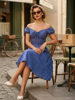 Robe mi-longue vintage à pois manches bouffantes et lien sur le devant (2026)