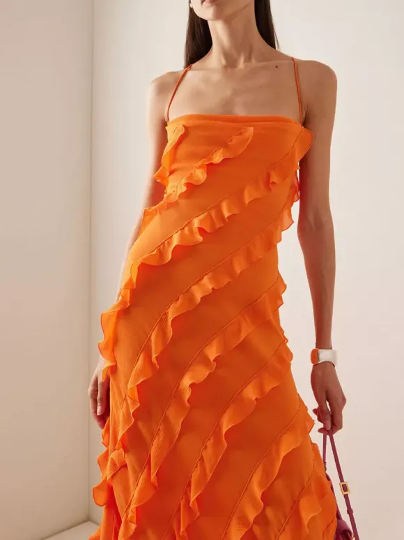 Robe moulante maxi orange sexy à bretelles spaghetti dos croisé volants et fente haute idéale pour une soirée en amoureux