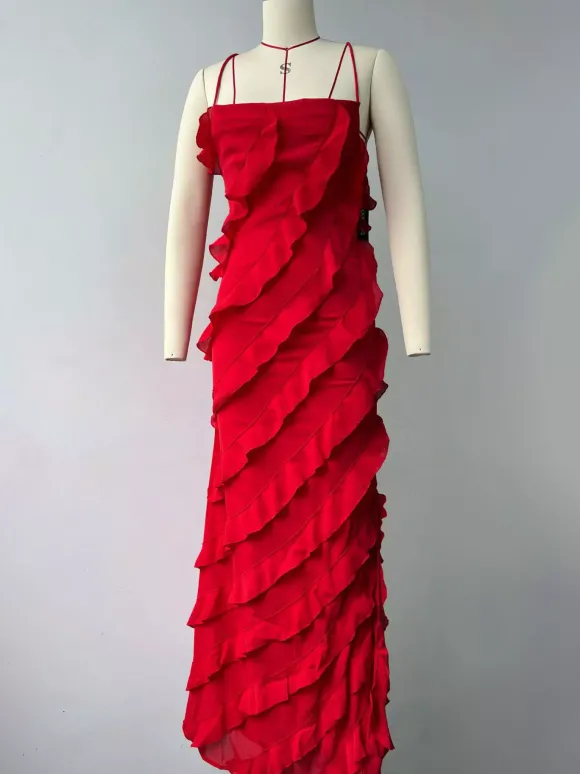 Robe moulante maxi orange sexy à bretelles spaghetti dos croisé volants et fente haute idéale pour une soirée en amoureux