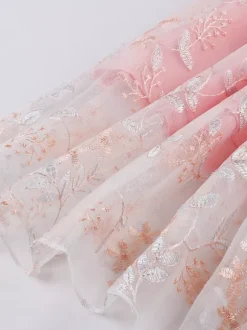 Robe rétro rose brodée coupe trapèze style années 50 robe midi évasée pour femme 2026