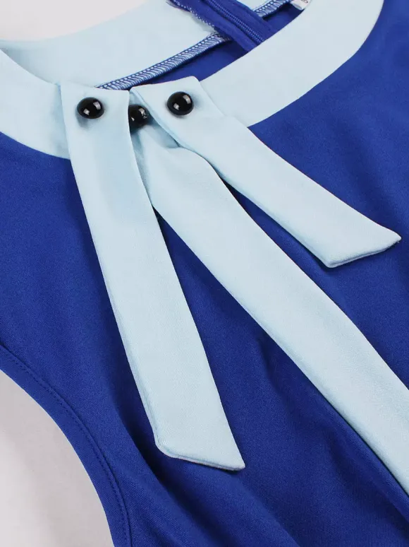 Robe swing vintage pour femme années 1950 ornée de détails contrastés col à n艙ud idéale pour un tea party.