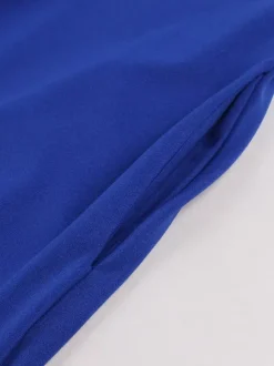 Robe swing vintage pour femme années 1950 ornée de détails contrastés col à n艙ud idéale pour un tea party.