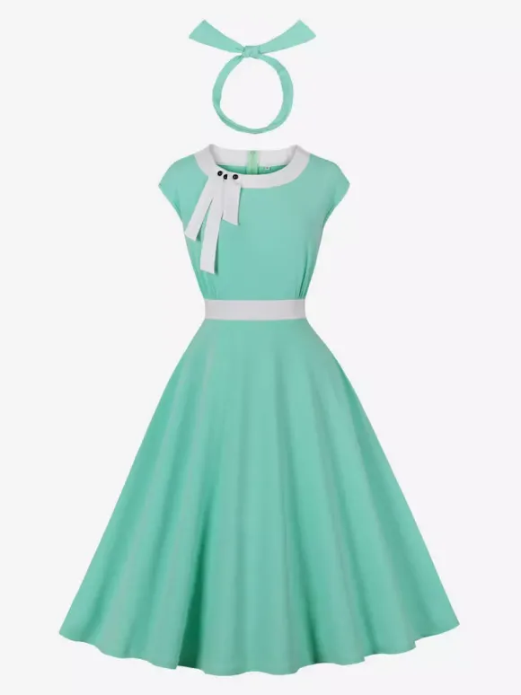 Robe swing vintage pour femme années 1950 ornée de détails contrastés col à n艙ud idéale pour un tea party.