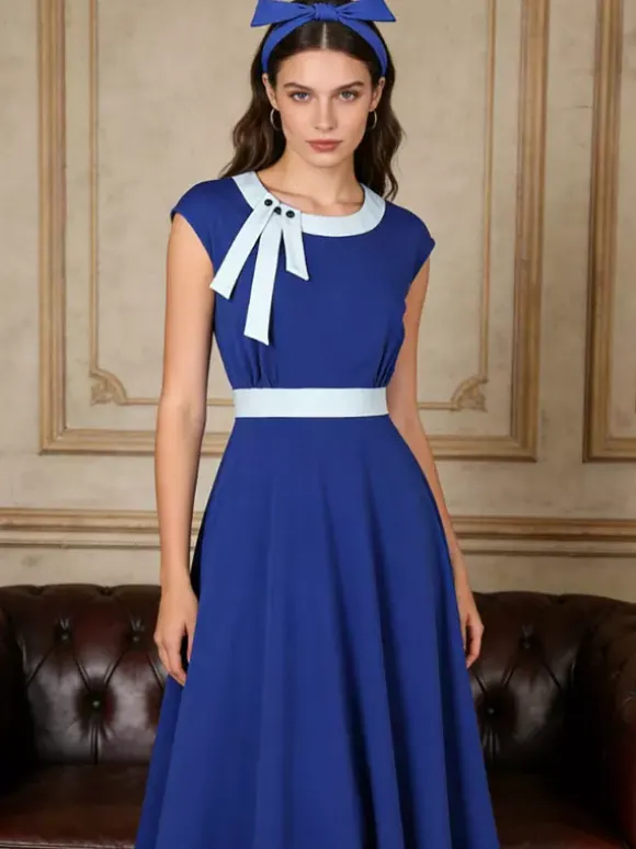 Robe swing vintage pour femme années 1950 ornée de détails contrastés col à n艙ud idéale pour un tea party.