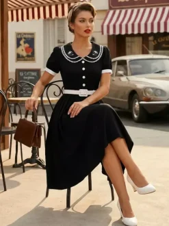 Robe trapèze à manches bouffantes col Peter Pan et broderies double épaisseur collection femme 2026
