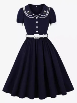 Robe trapèze à manches bouffantes col Peter Pan et broderies double épaisseur collection femme 2026