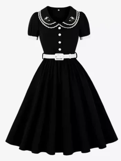 Robe trapèze à manches bouffantes col Peter Pan et broderies double épaisseur collection femme 2026