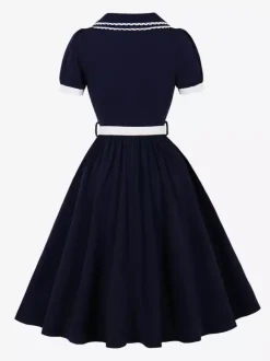 Robe trapèze à manches bouffantes col Peter Pan et broderies double épaisseur collection femme 2026
