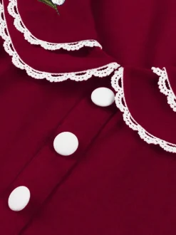 Robe trapèze à manches bouffantes col Peter Pan et broderies double épaisseur collection femme 2026