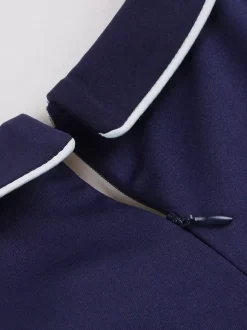 Robe trapèze plissée à col n艙ud et passepoil contrastant pour femme 2026