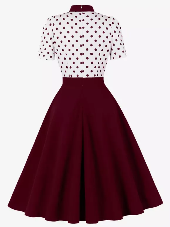 Robe trapèze rétro à pois patchwork col n艙ud papillon manches courtes collection 2026
