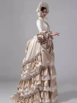 Robe victorienne champagne à volants manches longues évasées style maxi style rétro