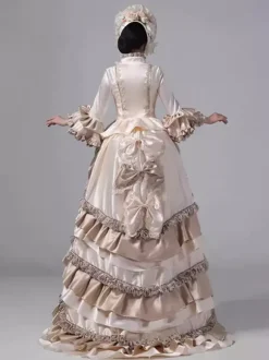 Robe victorienne champagne à volants manches longues évasées style maxi style rétro