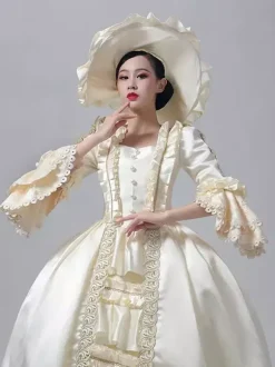 Robe victorienne pour femme couleur champagne manches longues style rétro robe de bal avec chapeau.