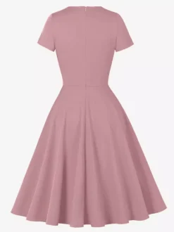 Robe cocktail swing vintage années 1950 manches courtes style rétro femme