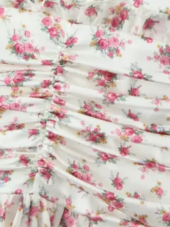 Robe courte à imprimé floral rose col en V manches longues été 2026
