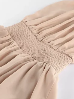 Robe courte kaki sans manches dos nu col montant taille naturelle