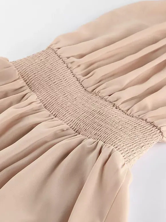 Robe courte kaki sans manches dos nu col montant taille naturelle