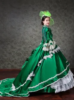 Robe de bal vintage pour femme style victorien rococo ornée de dentelle manches évasées col montant et volants en dentelle.