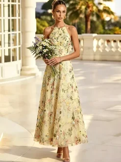 Robe de demoiselle d'honneur dos nu à broderies florales rose poudré coupe trapèze en tulle long robe de mariée longue en tulle.