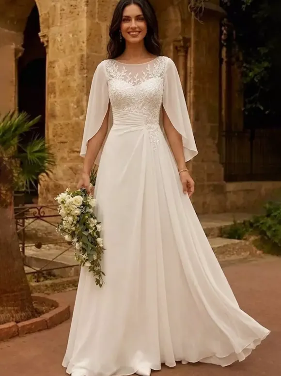 Robe de mariée avec châle coupe trapèze manches mi-longues dentelle col bijou