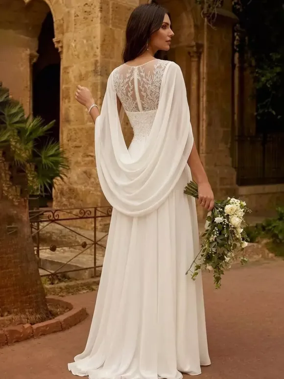 Robe de mariée avec châle coupe trapèze manches mi-longues dentelle col bijou