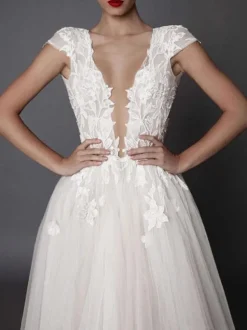 Robe de mariée bohémien ivoire en tulle col V plongeant dos nu jupe fendue robe de mariage