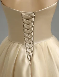 Robe de mariée champagne en satin bustier laçage sur dos longueur mollet Robe de mariage