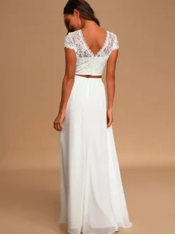 Robe de mariée deux pièces ivoire haut en dentelle col rond manche courte jupe en tulle