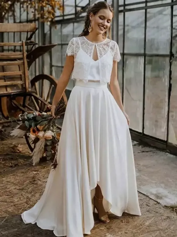 Robe de mariée 3 pièces en dentelle col bijou coupe trapèze fermeture éclair manches courtes