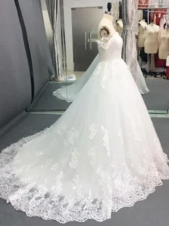 Robe de mariée princesse en tulle ivoire à traîne ronde robe de mariage